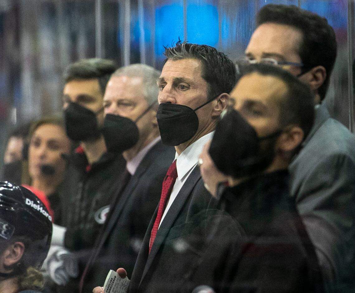 Carolina Hurricanes coach Rod BrindAmour and his assistant watch the first period against Tampa Bay during game one of their second round Stanley Cup series on Sunday, May 30, 2021 at PNC Arena in Raleigh, N.C.