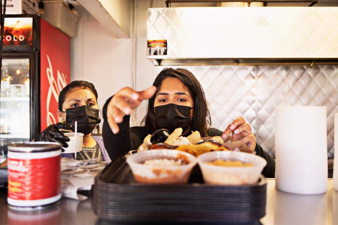 Owner Biridiana Frausto, center, jumps in to do everything at her restaurant, Fonda Lupita, including working the line on Wednesday, Jan. 19, 2022. The Sanford restaurant serves homestyle Mexican food based on Frausto’s mother’s recipes and changes its menu daily.