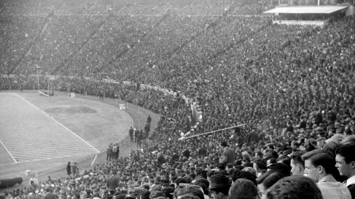 Fans watch the 1939 Duke-Carolina game in Durham, NC.