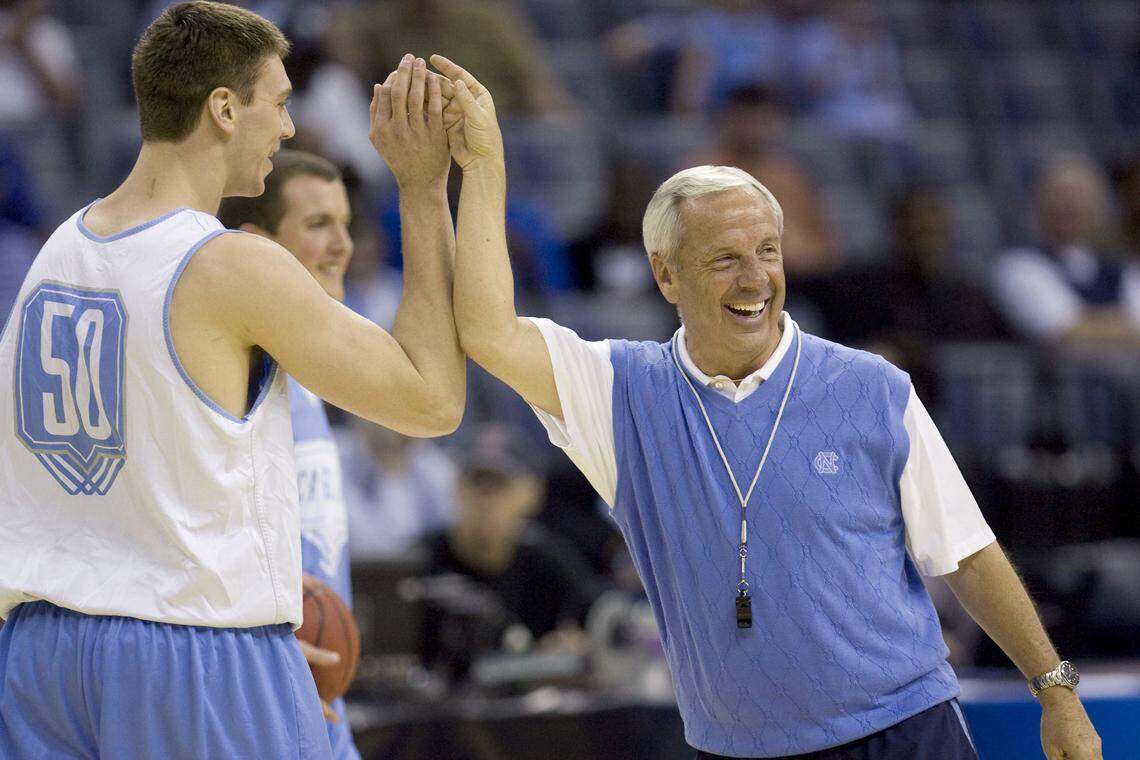 UNC coach Roy Williams congratulates Tyler Hansbrough (50) after a crowd pleasing dunk during the Tar Heels’ practice on Thursday March 26, 2009 in FedExForum. UNC will play Gonzaga tomorrow night in Memphis. ROBERT WILLETT robert.willett@newsobserver.com