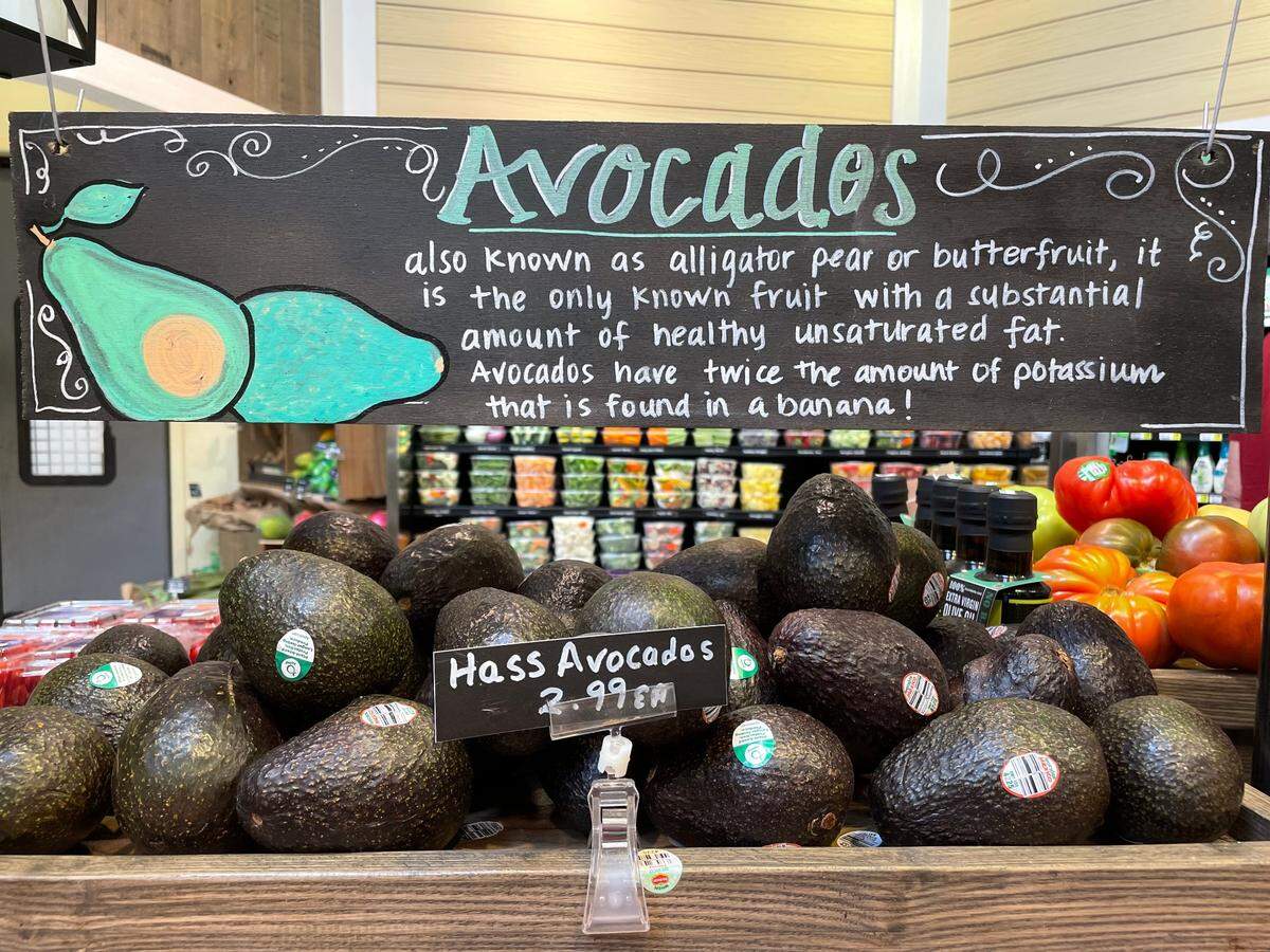 The avocado display at Lowes Foods on Strickland Road in Raleigh on June 28. The grocer is currently marketing itself as “the Swiss Army Knife of grocery stores.”