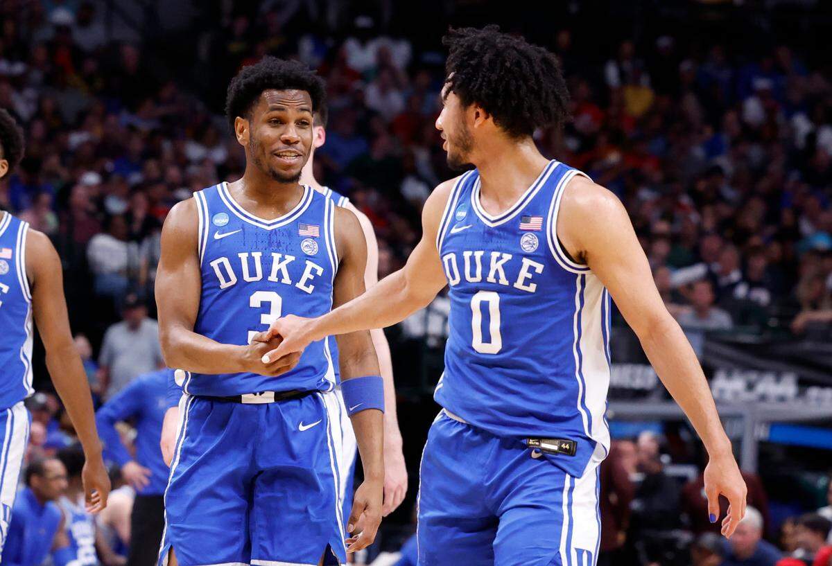 Duke’s Jeremy Roach (3) talks with Jared McCain (0) during the first half of Duke’s game against Houston in their NCAA Tournament Sweet 16 game at the American Airlines Center in Dallas, Texas, Friday, March 29, 2024.