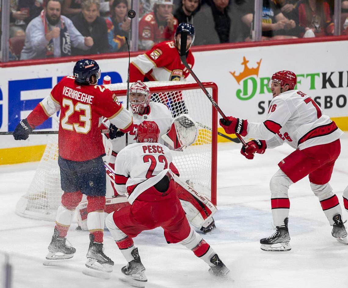 Carolina Hurricanes goalie Frederik Andersen (31) deflects a scoring attempt by the Florida Panthers Carter Verhaeghe (23) in the first period during Game 3 of the Eastern Conference Finals on Monday, May 22, 2023 at FLA Live Arena in Sunrise, Fla.