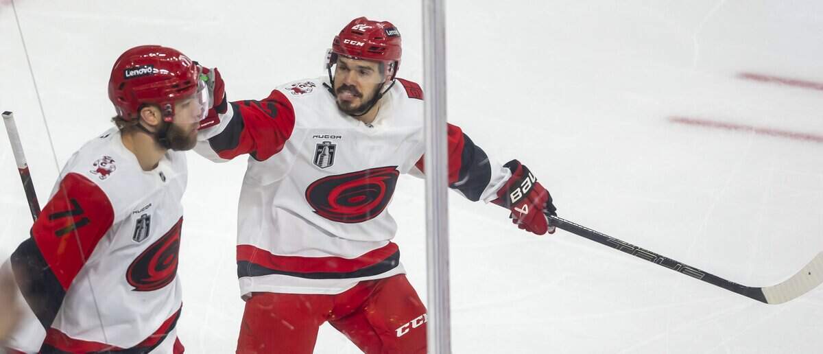 Carolina Hurricanes center Logan Stankoven (22) celebrates with left wing Taylor Hall (71) after Hall’s goal in the first period during Game 6 of the Stanley Cup Final, on Sunday, June 14, 2026 at T-Mobile Arena in Las Vegas, NV.
