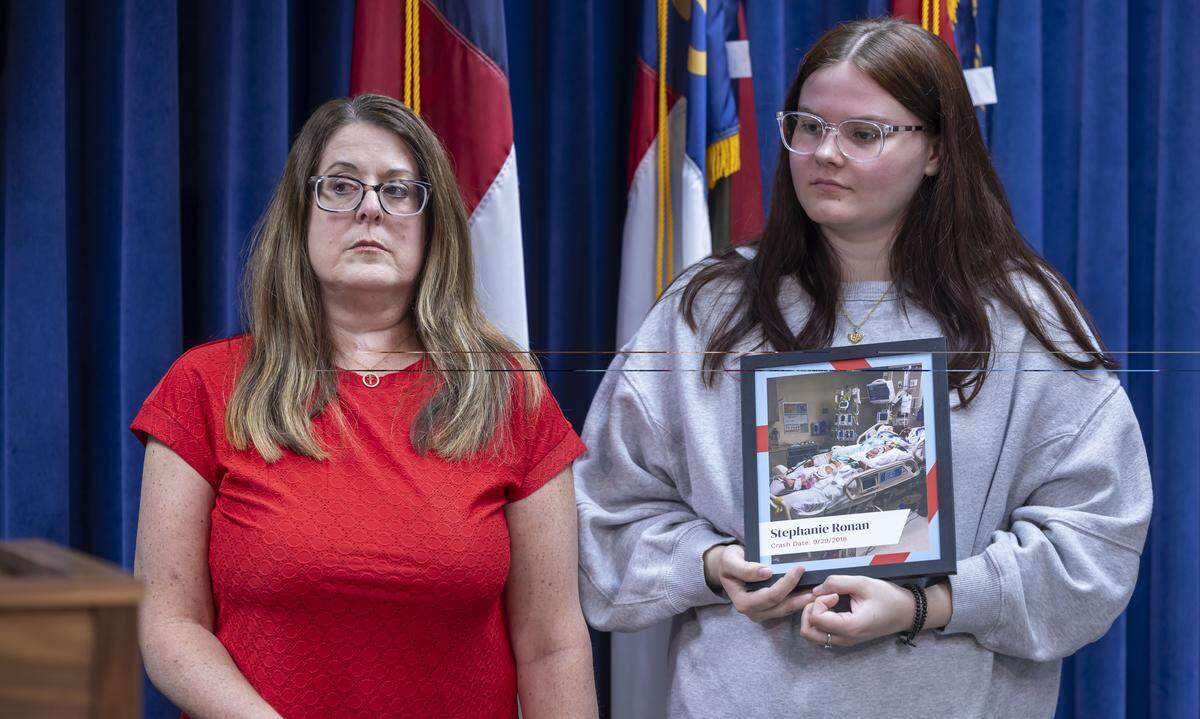 Stephanie Ronan, and her daughter Jenna Crawford, attend a press briefing to show support for HB 1199, legislation that will close loopholes in the current ignition interlock law helping to curb rising alcohol related crashes, on Wednesday, May 13, 2026 at the General Assembly in Raleigh, N.C. Stephanie Ronan was involved in an auto accident with an impaired driver in 2018. 