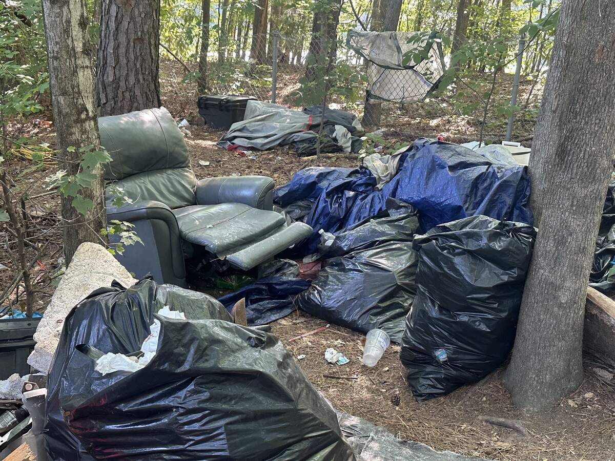 Raleigh police gave people until 6 a.m. Friday, June 12, to vacate a camp at Exit 290 from Interstate 40.