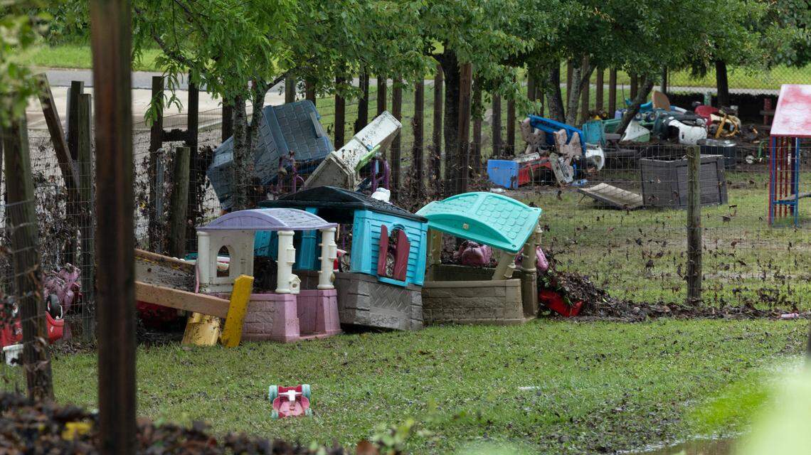 Play equipment and toys are flooded near Little Buffalo Creek in downtown Sanford on Saturday, June 5, 2025. Flash flooding hit the city Thursday afternoon, blocking downtown streets, causing several car accidents and trapping residents in parts of town.