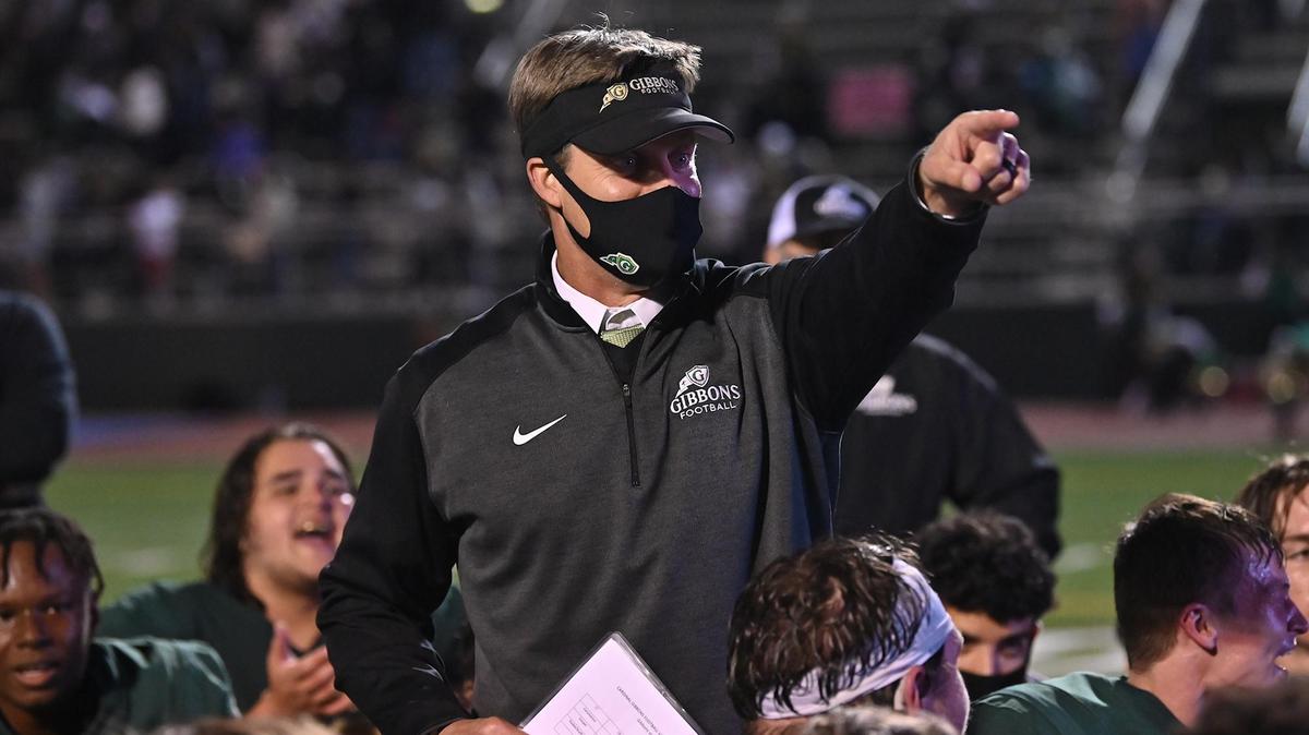 Cardinal Gibbons’ head coach Steven Wright addresses his team after their victory over Richmond. The Cardinal Gibbons Crusaders and the Richmond Raiders met in a NCHSAA 4A second round playoff game in Raleigh, N.C. on April 23, 2021.