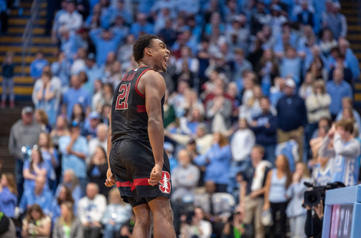 Stanford guard Jaylen Blakes (21) reacts after sinking a two-point basket with :02 seconds to play to give Stanford a 72-71 victory over North Carolina on Saturday, January 18, 2025 at the Smith Center in Chapel Hill, N.C. Blakes, a former Duke guard, said after the game, ‘I was overjoyed’, as he made the rounds looking at the dejected fans in the Smith Center.
