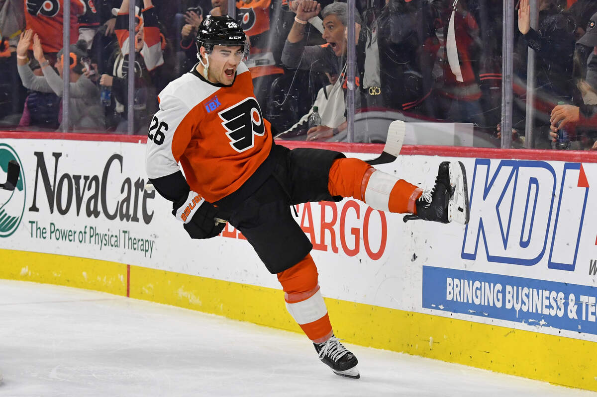 Feb 27, 2024; Philadelphia, Pennsylvania, USA; Philadelphia Flyers defenseman Sean Walker (26) celebrates his goal against the Tampa Bay Lightning during the third period at Wells Fargo Center. Eric Hartline-USA TODAY Sports