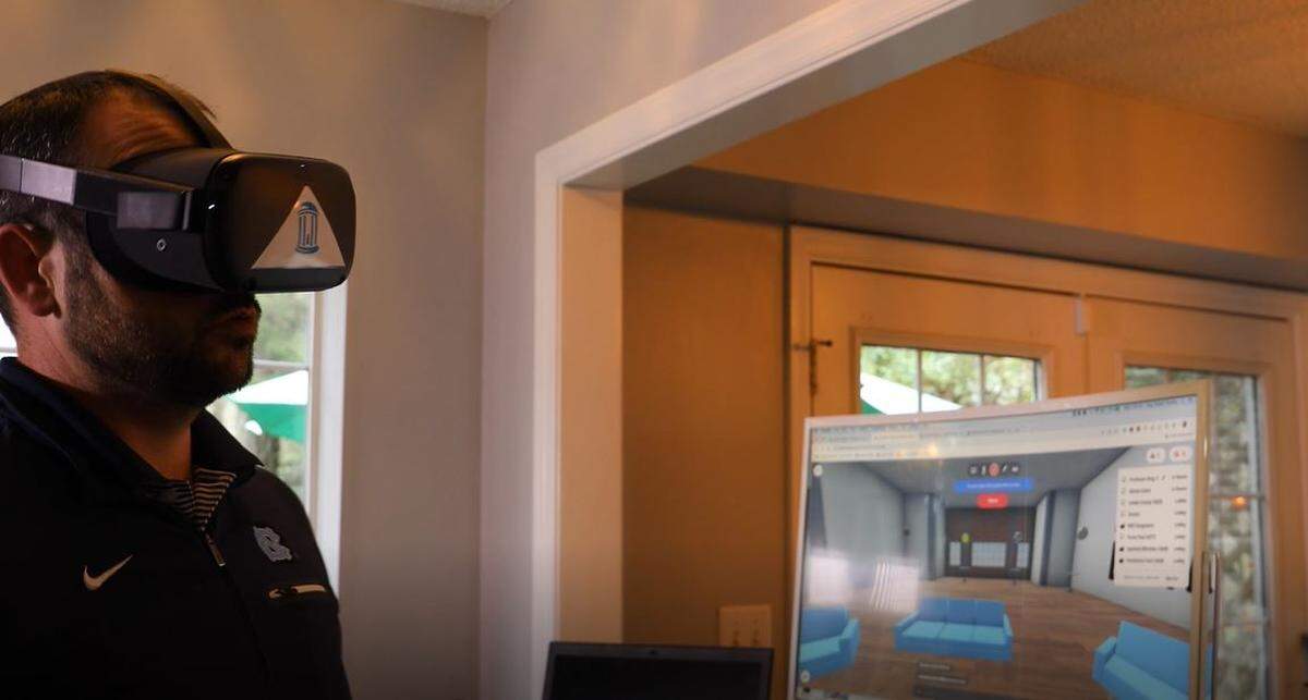 Steven King, an associate professors at UNC-Chapel Hill’s Hussman School of Journalism and Media, demonstrates teaching in the virtual reality classroom he created for his students.