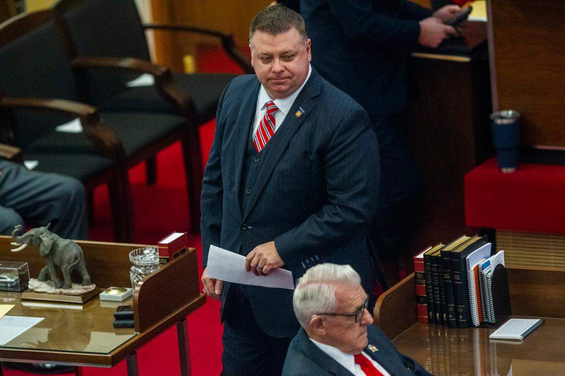 Rep. Jason Saine walks to his desk after speaking in the House chamber Wednesday Jan. 13, 2021 at the North Carolina General Assembly.