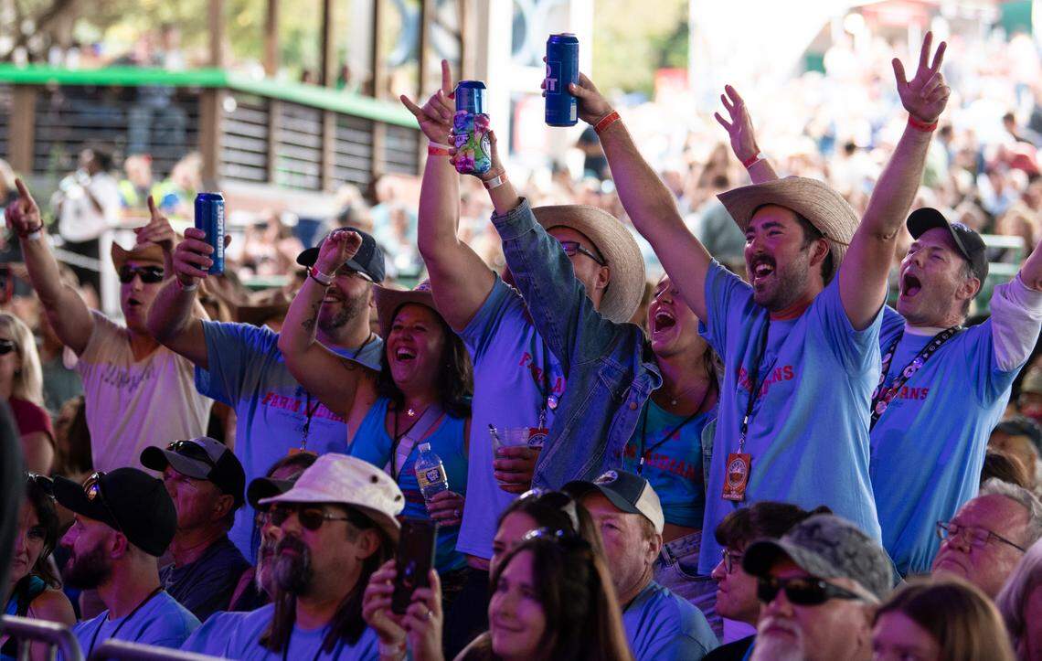 Fans sing along with Sheryl Crow during her set at Farm Aid at Raleigh, N.C.’s Coastal Credit Union Music Park at Walnut Creek, Saturday, Sept. 24, 2022.
