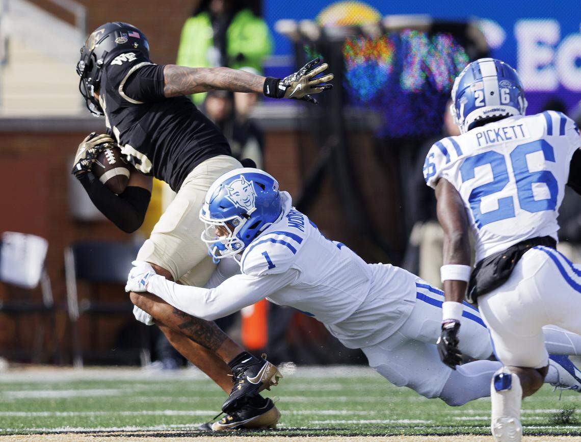 Duke’s Terry Moore tackles Wake Forest’s Horatio Fields during the first half of the Blue Devils’ game at Allegacy Stadium on Saturday, Nov. 30, 2024, in Winston-Salem.