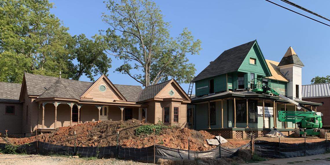 Preservation North Carolina moved its headquarters into the restored Rev. Plummer T. Hall House, left, and the Graves-Fields House, right, in Raleigh’s Oberlin Village.