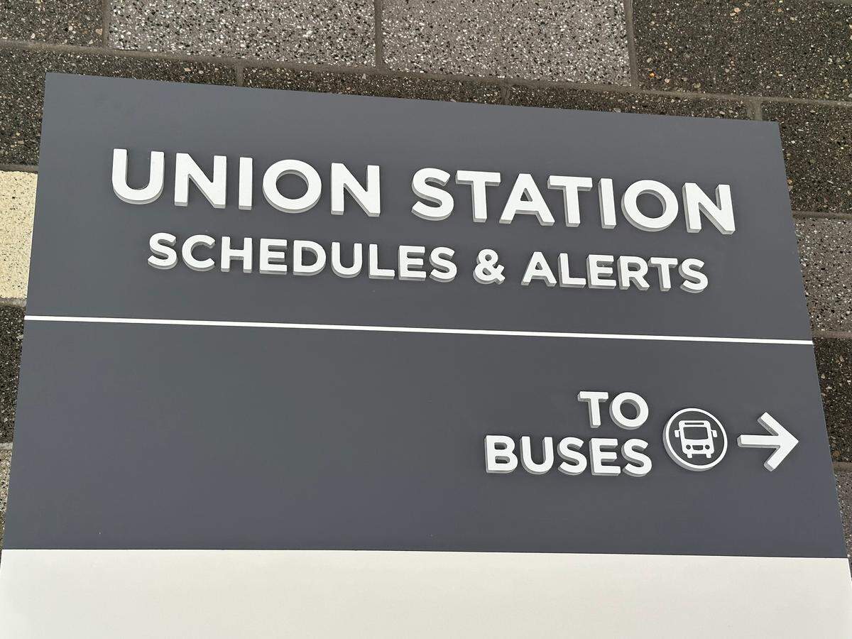 A sign in the new RUS Bus station to guide travelers.