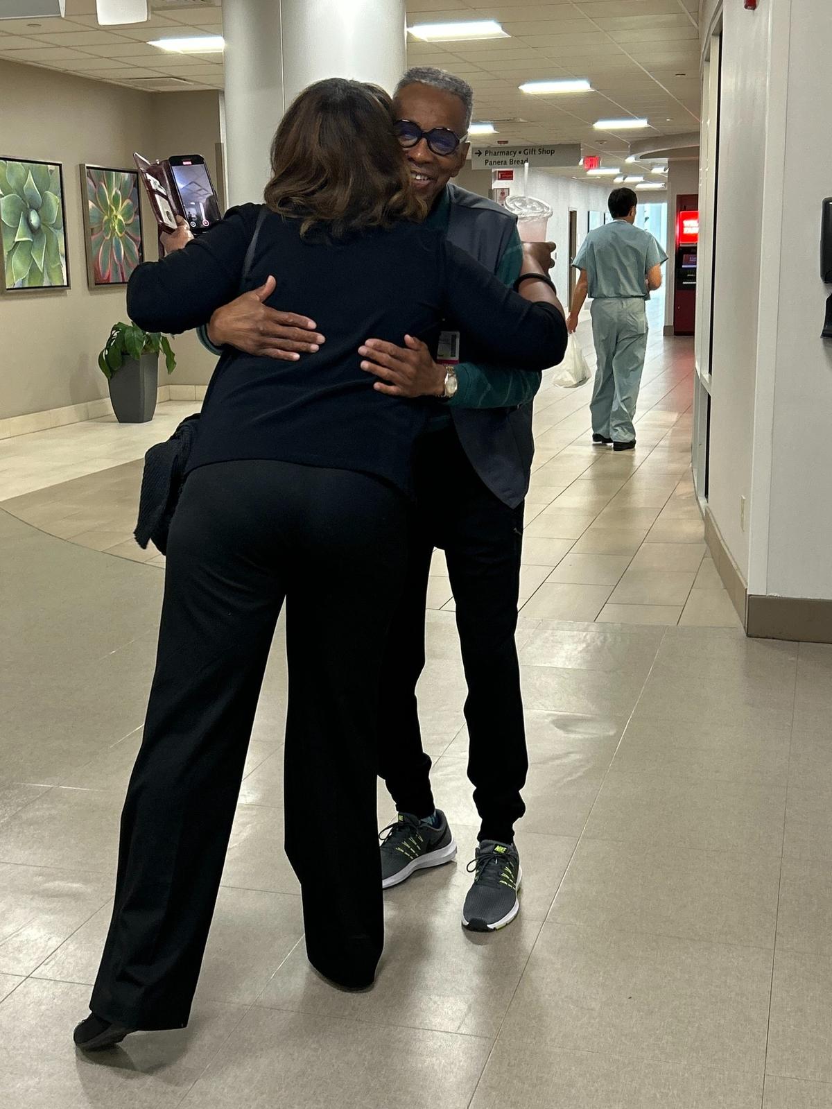 Walter Moreland hugs, taps the shoulder or at least points at every passer-by in the WakeMed hallways during his Friday performances.