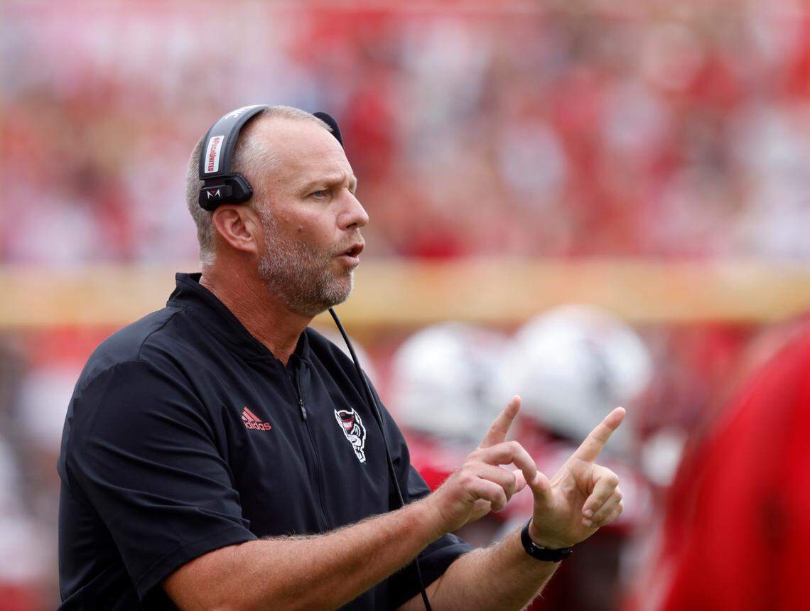 N.C. State head coach Dave Doeren gives instructions from the sideline during the first half of the Wolfpack’s game against Charleston Southern on Saturday, Sept. 10, 2022, at Carter-Finley Stadium in Raleigh, N.C.