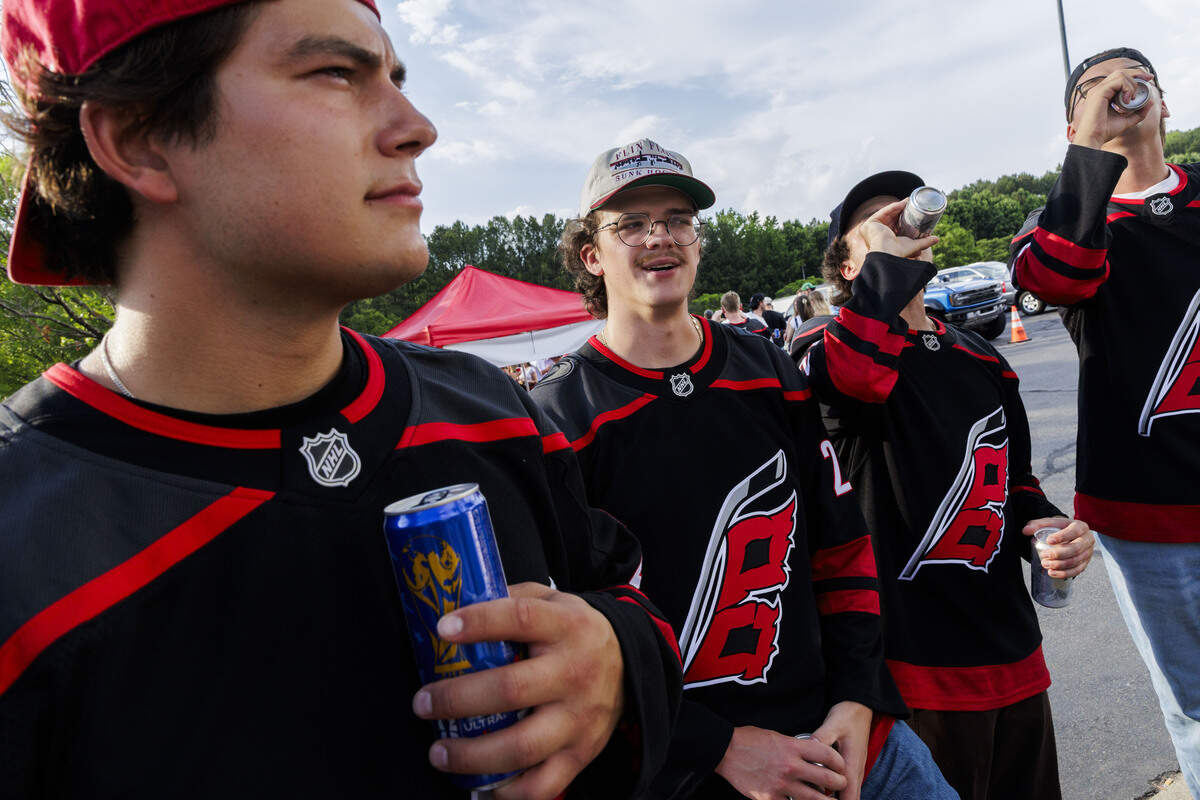 Noah Wagner, Lucas Fry, Sloan Tremblay, Bryan Hanna (left to right) Lucas Humble and Matt McLeod (not pictured) represented Carolina Hurricanes forward and their friend Seth Jarvis by sporting his #24 jersey while in the parking lot outside the Lenovo Center on June 11, 2026, in Raleigh, North Carolina. The Carolina Hurricanes take on the Las Vegas Golden Knights for Game 5 of the Stanley Cup Final.