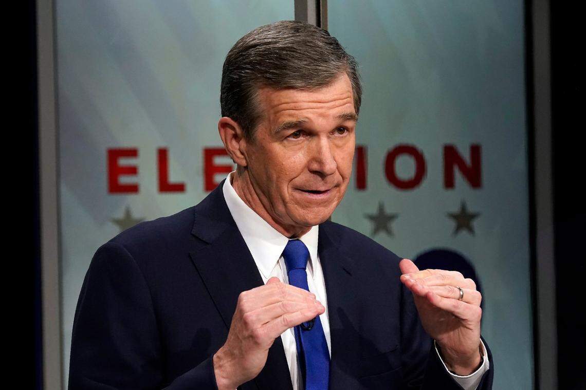 North Carolina Gov. Roy Cooper makes a comment during a live televised debate with Lt. Gov. Dan Forest at UNC-TV studios in Research Triangle Park, N.C., Wednesday, Oct. 14, 2020.