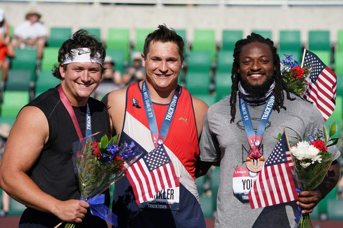 Silver medalist Daniel Haugh, left, gold medalist Rudy Winkler, middle, and bronze medalist Alex Young, right, pose after the 2021 USA Olympic Track and Field Team Trials Day 3 at Hayward Field, Eugene, Oregon on Saturday, June 20, 2021.