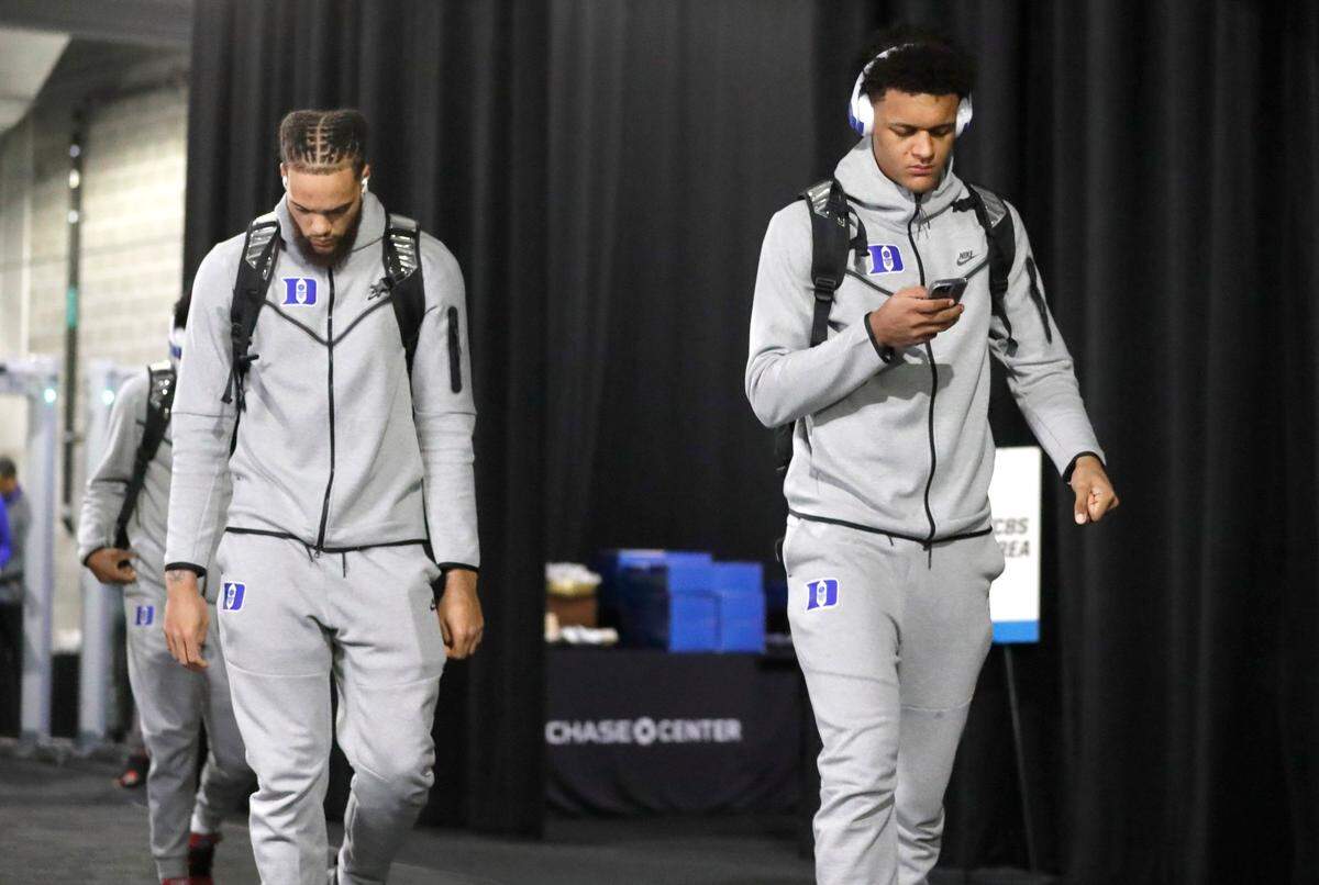Dukes Theo John left, and Paolo Banchero walk into the Chase Center in San Francisco, Calif., before Dukes game against Texas Tech in the Sweet 16 round of the NCAA Tournament Thursday, March 24, 2022.