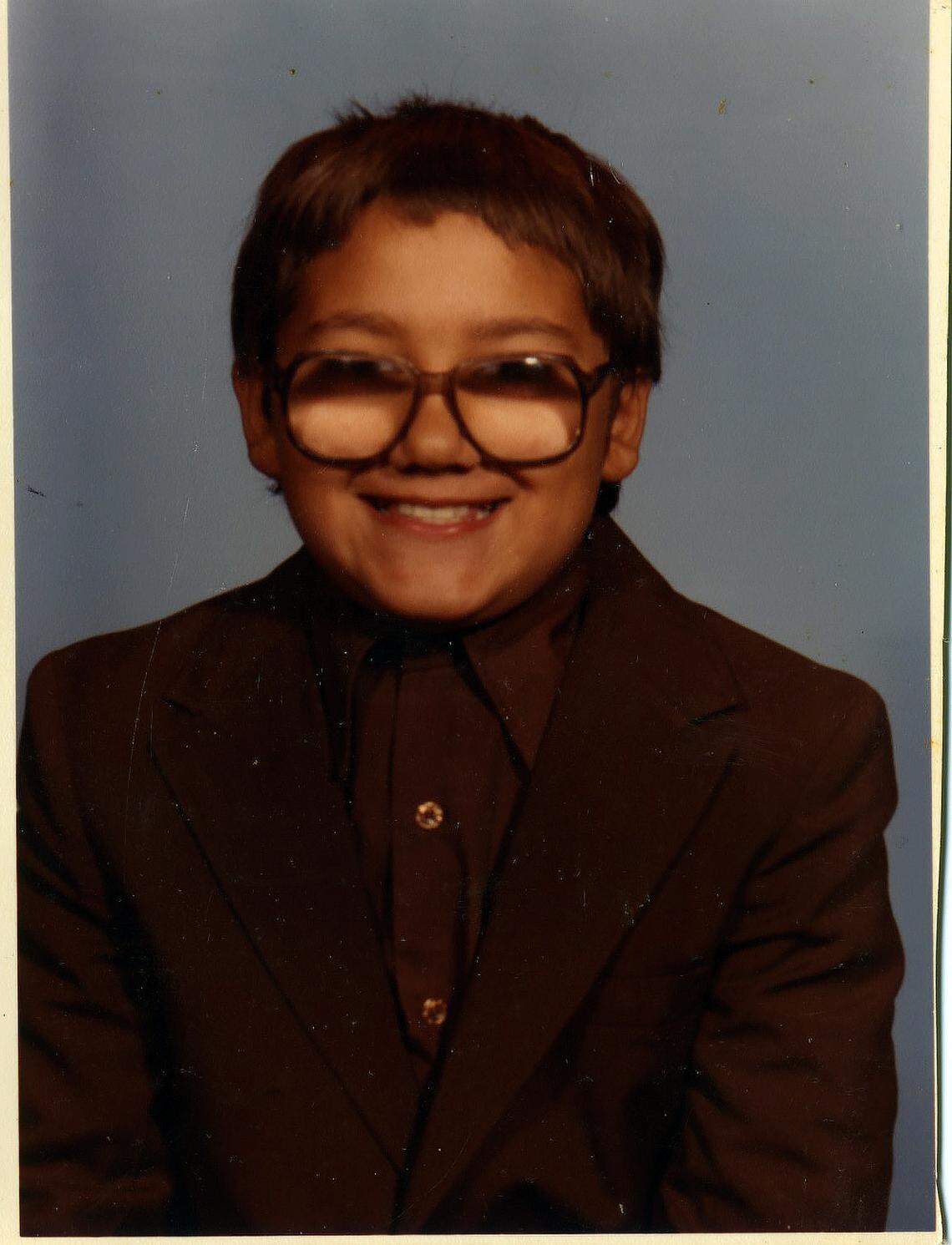 Chris Jacobs wearing his Sunday suit for his third grade school photo in Scotland County.