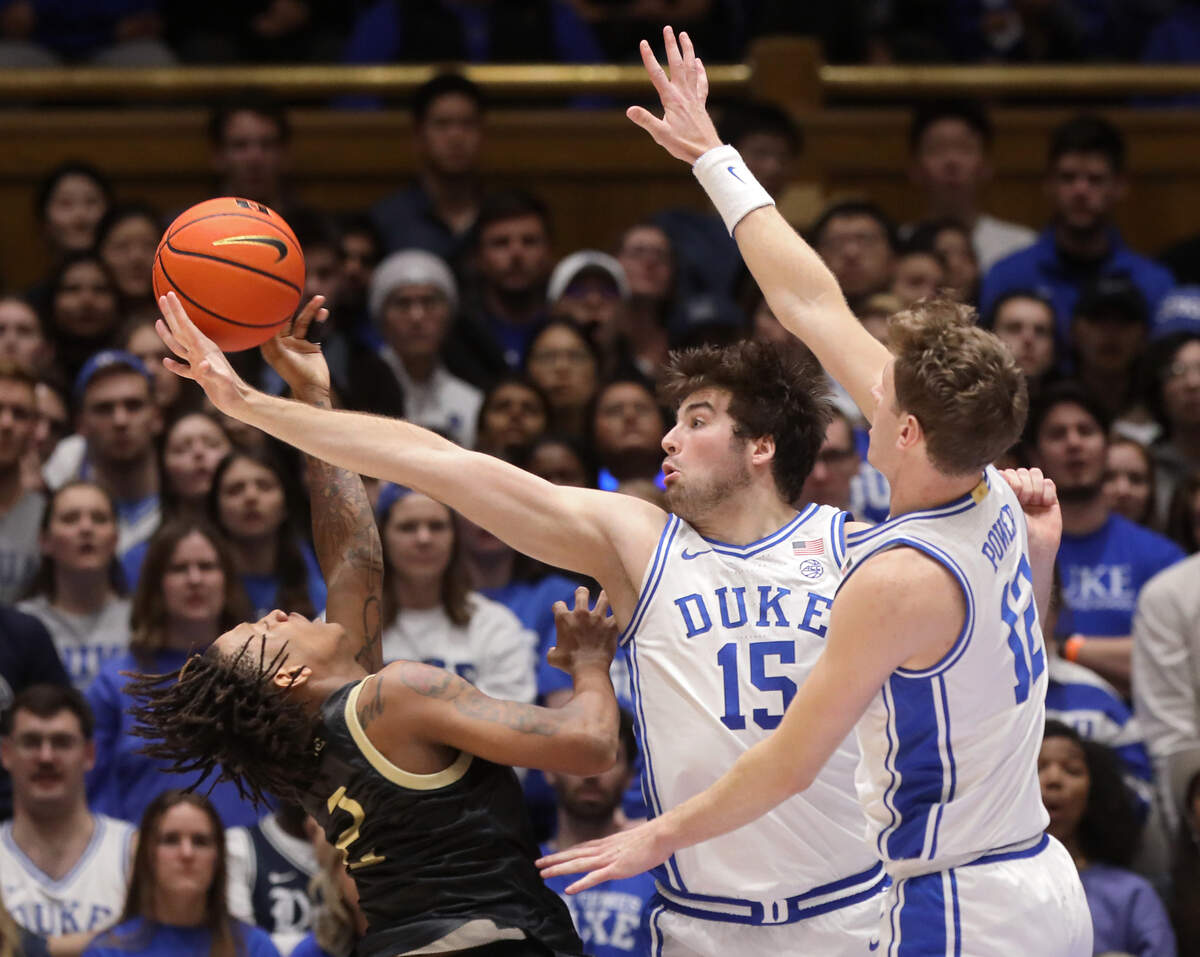 Duke’s Ryan Young defends a shot by UNC Pembroke’s Dallas Gardner during the first half of the Blue Devils’ 109-64 exhibition win on Wednesday, Nov. 1, 2023, at Cameron Indoor Stadium in Durham, N.C.