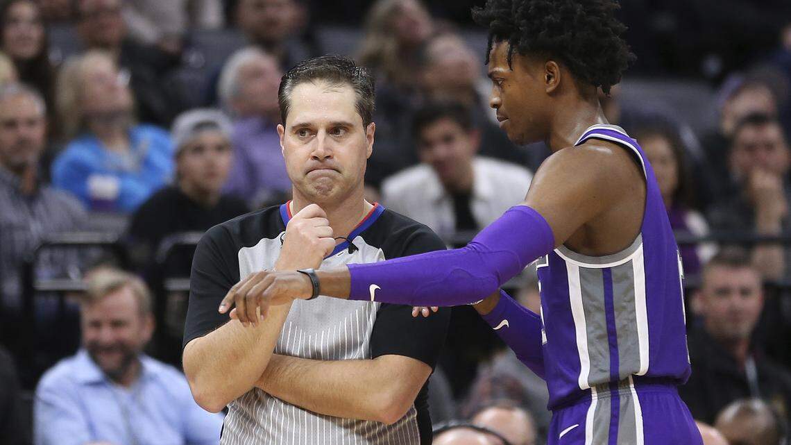 Former N.C. State baseball player David Guthrie, listening to the pleas of Sacramento Kings guard DeAaron Fox in January, will officiate Sunday’s NBA All-Star Game in Charlotte.