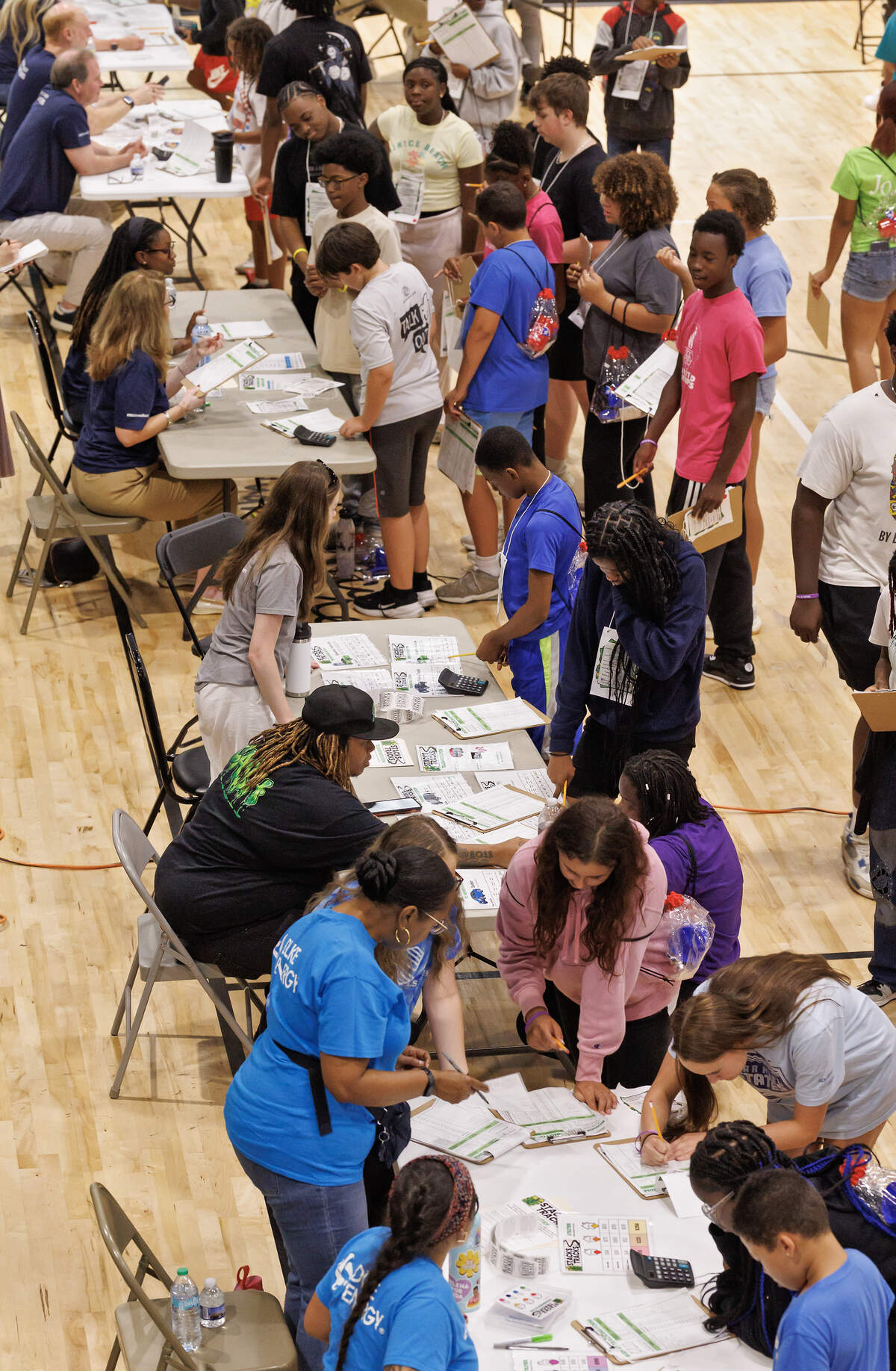 During the “Stacks” segment, students make decisions about which cars to buy, what kind of technology plans they want and how much they want to spend on groceries.