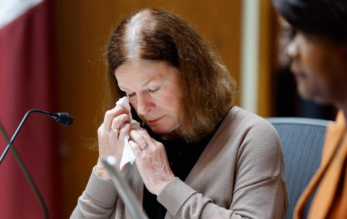 Raleigh Mayor Mary-Ann Baldwin dabs her eye after City Manager Marchell Adams-David addressed the community during the Raleigh City Council meeting Tuesday, Oct. 18, 2022, about the mass shooting in the Hedingham community Thursday, Oct. 13.