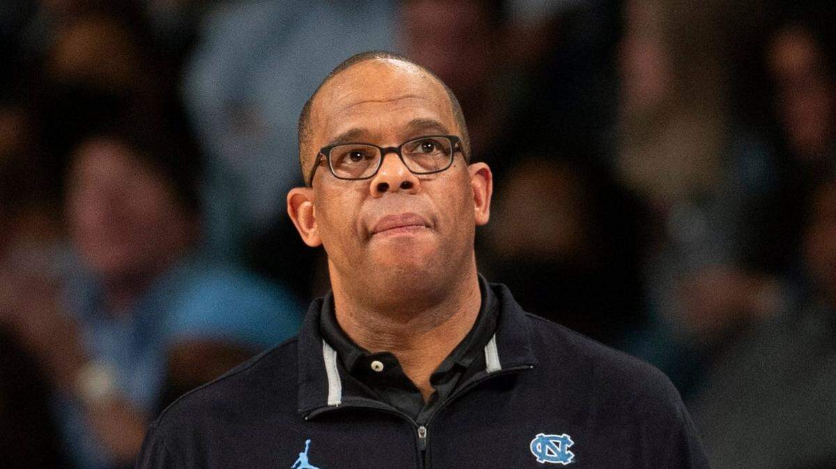 North Carolina head coach Hubert Davis watches the court during the first half of an NCAA college basketball game against Georgia Tech, Sunday, Dec. 5, 2021, in Atlanta. (AP Photo/Hakim Wright Sr.)