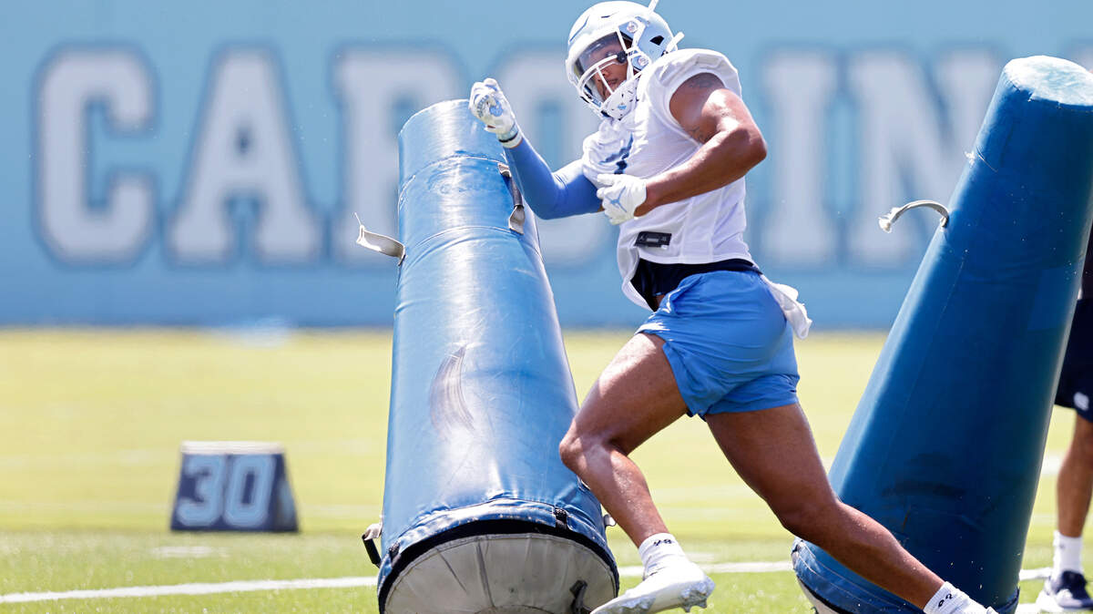 North Carolina linebacker Noah Taylor runs a drill during UNC’s first football practice of the season on Friday, July 29, 2022, in Chapel Hill, N.C.