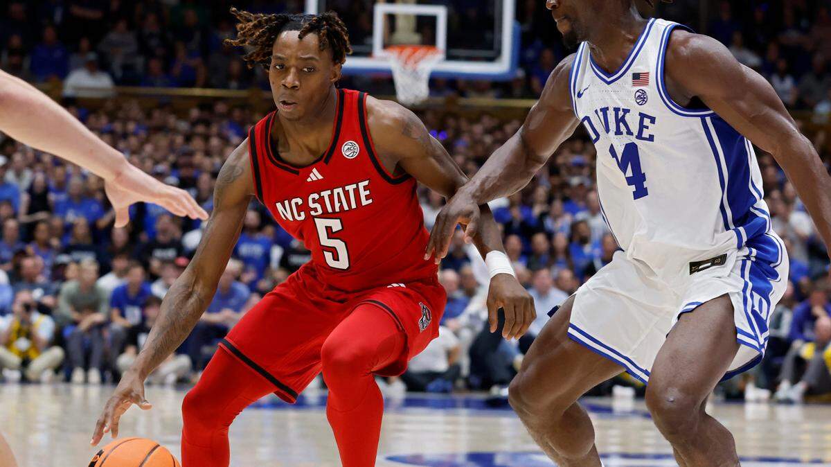N.C. State’s Trey Parker drives past Duke’s Sion James during the second half of the Wolfpack’s 74-64 loss on Monday, Jan. 27, 2025, at Cameron Indoor Stadium in Durham, N.C.