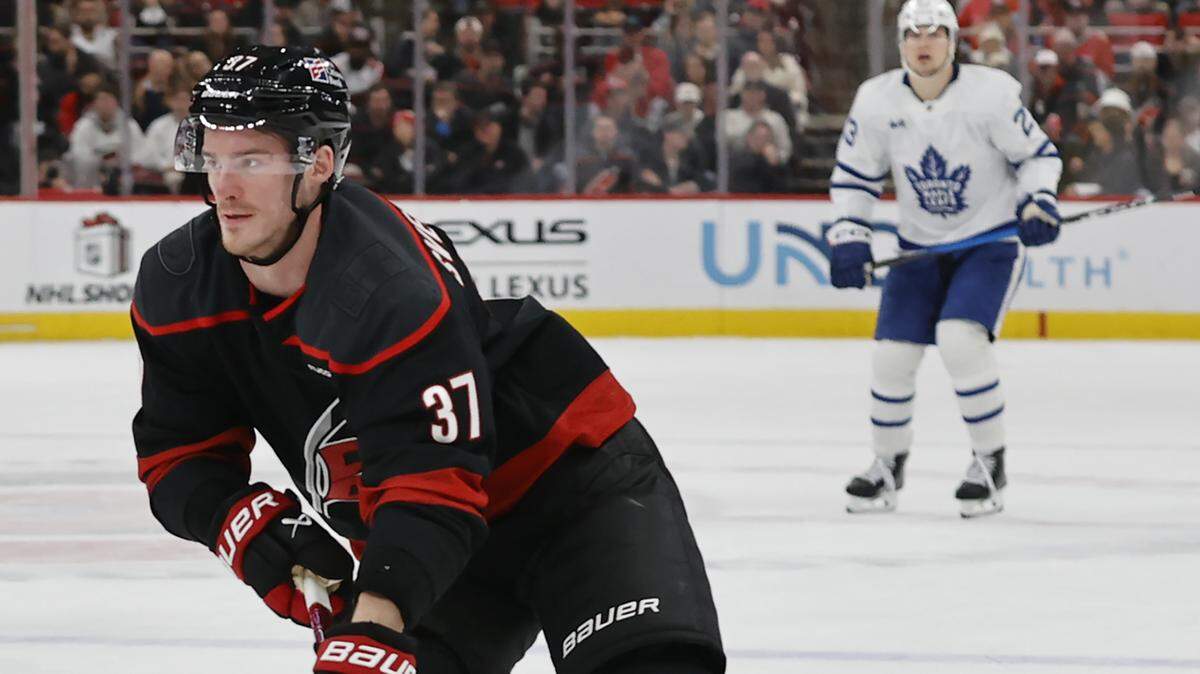 Andrei Svechnikov of the Carolina Hurricanes skates with the puck during the second period against Toronto at Lenovo Center on Dec. 4, 2025 in Raleigh, North Carolina.