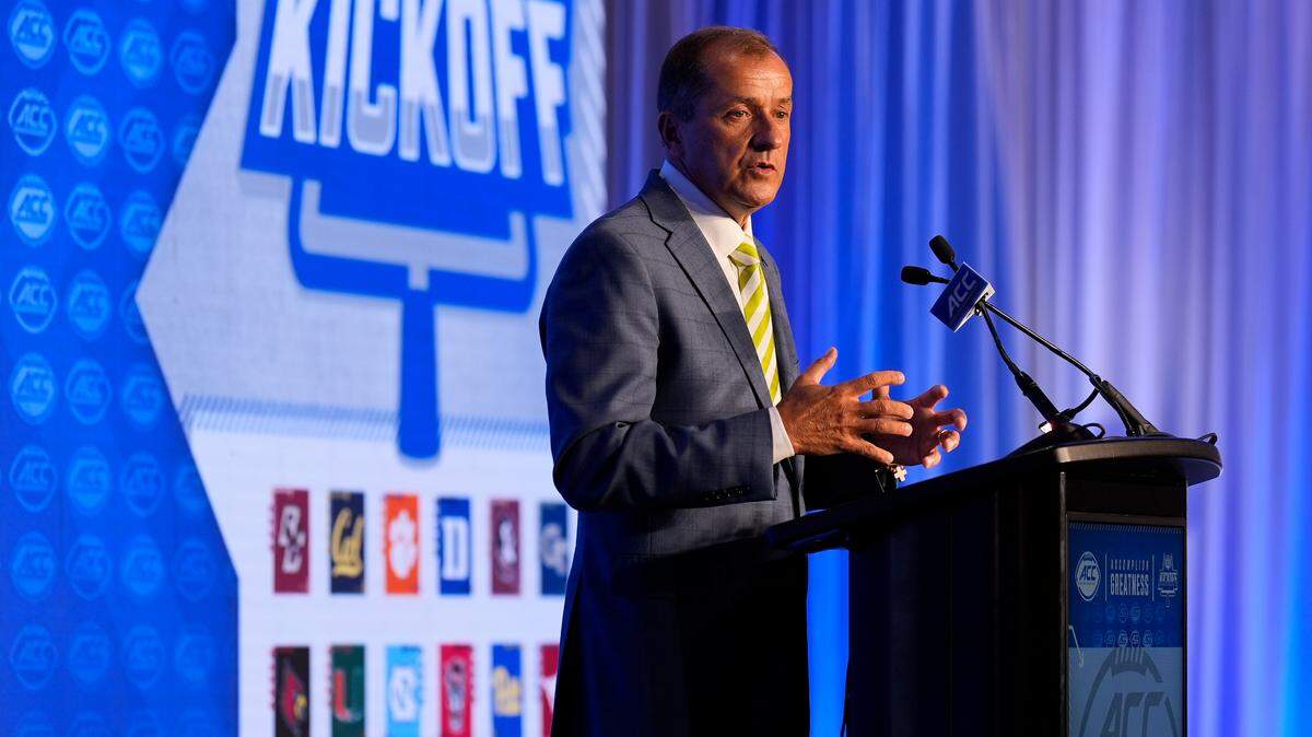 ACC Commissioner Jim Phillips speaks to the media during ACC Kickoff at Hilton Charlotte Uptown.