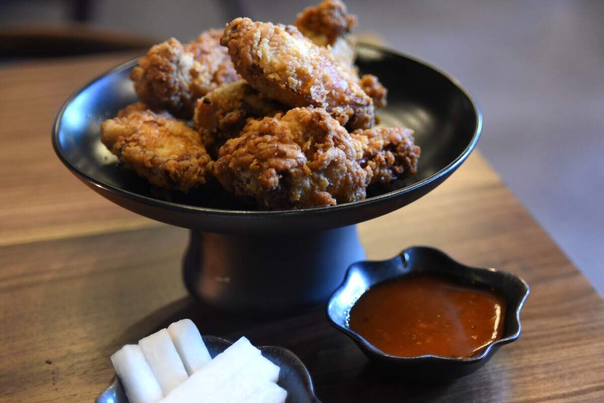 The fried chicken at M Hansik in Durham, served with a gochujang dipping sauce.