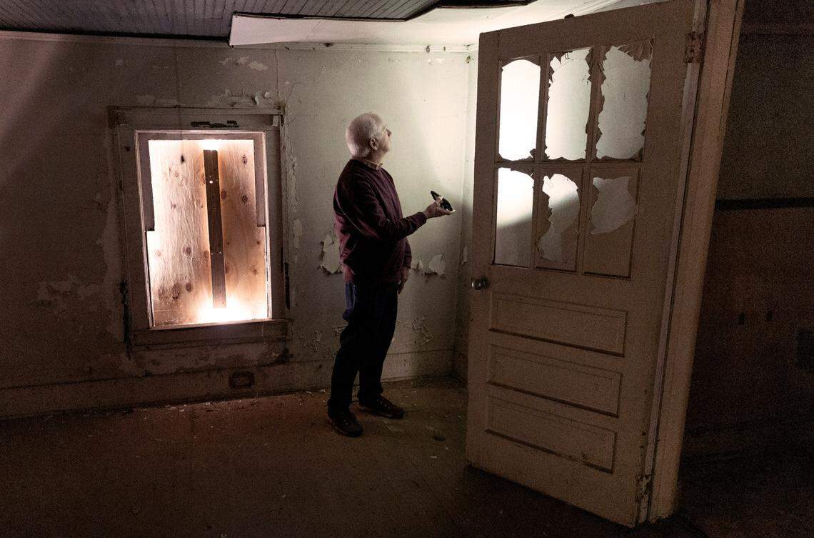 Myrick Howard looks over the Thomas Reynolds house in Warrenton, N.C. on Monday, Nov. 13, 2023. The home, which dates to the early 19th century is also known as Reynolds Tavern and is being offered for sale by Preservation North Carolina.
