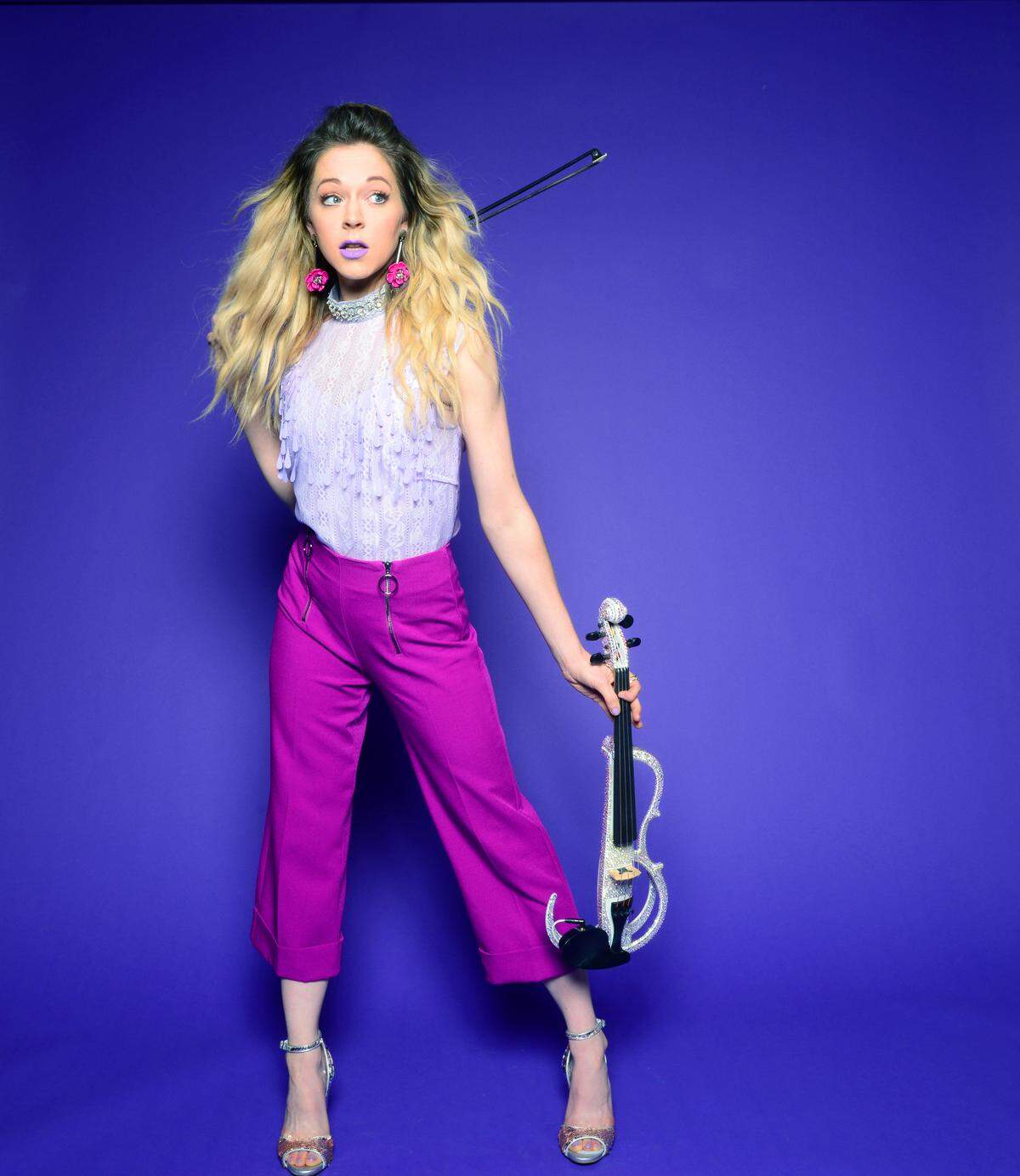 Electronic violinist Lindsey Stirling, pictured, is touring with Evanescence for a co-headlining tour. They will stop in Raleigh, NC, July 21, 2018.