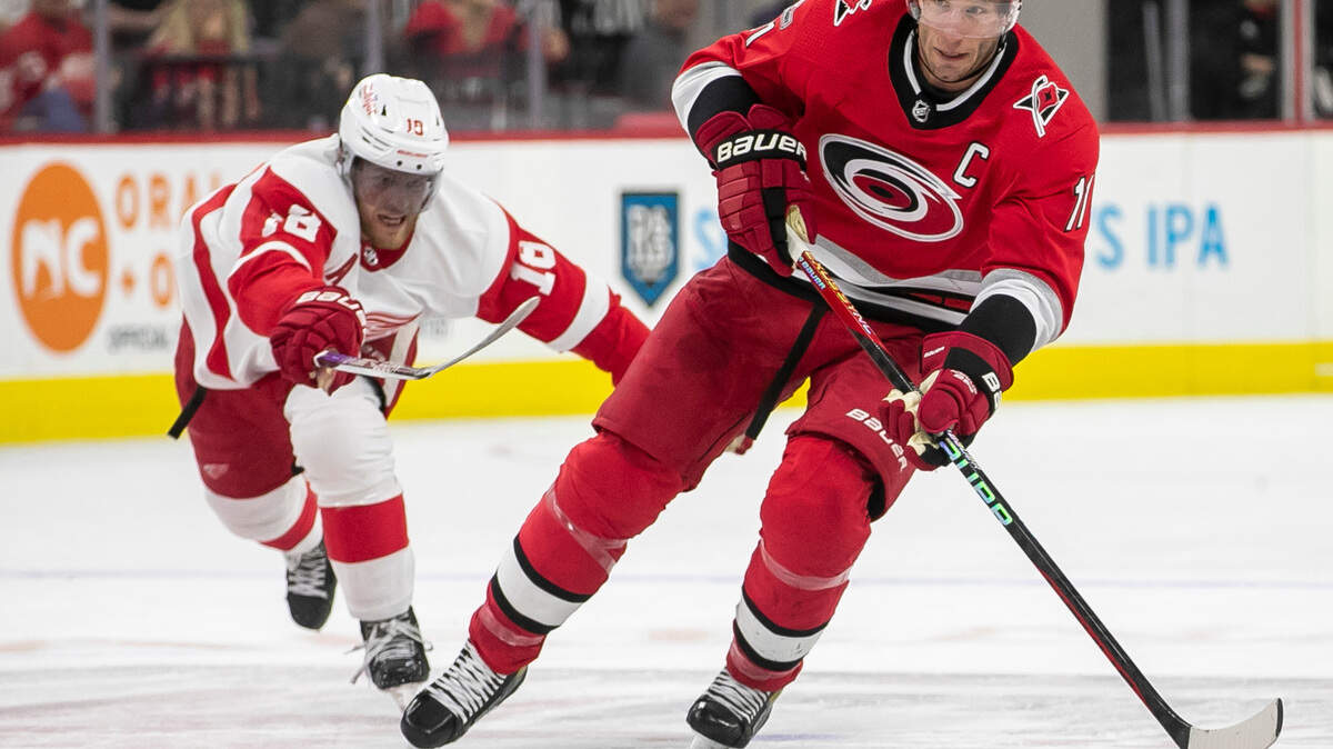 Carolina Hurricanes’ Jordan Staal (11) controls the puck ahead of Detroit’s Andrew Copp (18) in the first period on Tuesday, April 11, 2023 at PNC Arena in Raleigh, N.C.