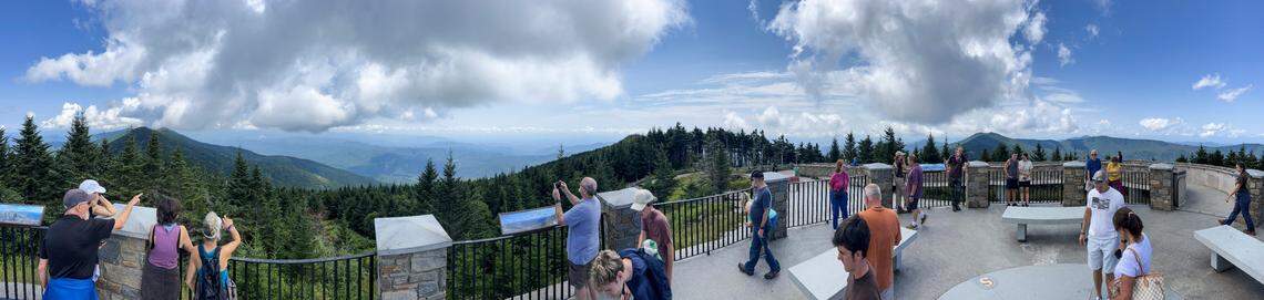 Tourists take in the view from the summit of Mount Mitchell State Park. The viewing area is the highest point east of the Mississippi at 6,684 feet.
