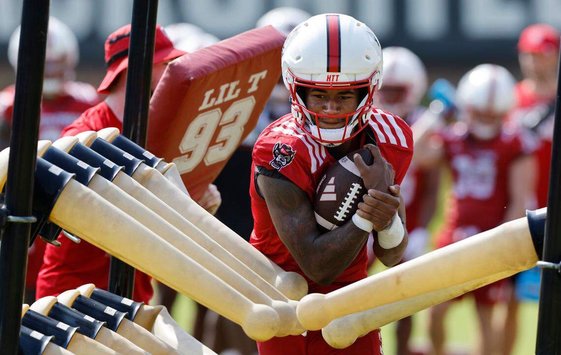 N.C. State wide receiver KC Concepcion (10) runs drills during the Wolfpack’s first practice in Raleigh, N.C., Wednesday, July 31, 2024.