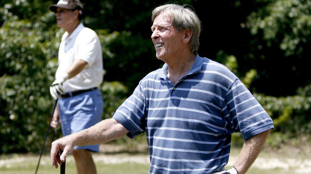 Members of the 1971 Orangeburg-Wilkinson High School football team gathered at Kountryside Golf Course near Denmark for a reunion. Here Dick Sheridan, foreground and Wayne Earhardt play golf.