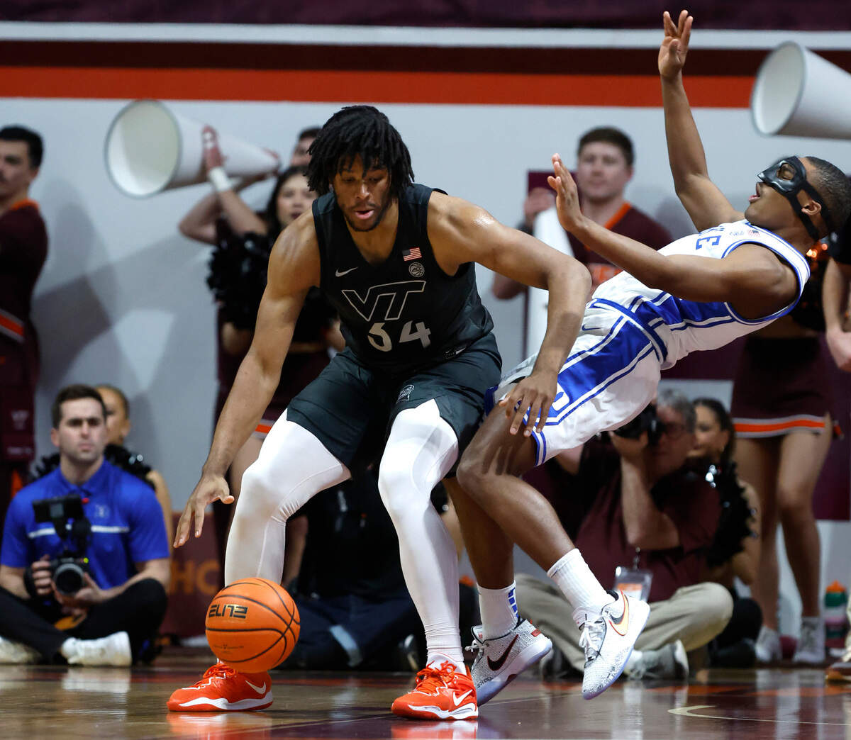 Virginia Tech’s Mylyjael Poteat (34) fouls Duke’s Jaylen Blakes (2) during the first half of Duke’s game against Virginia Tech at Cassell Coliseum in Blacksburg, VA., Monday, Jan. 23, 2023.