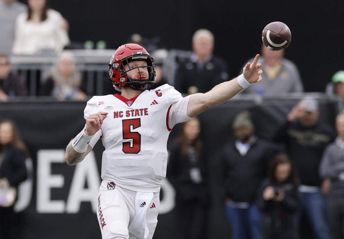 N.C. State quarterback Brennan Armstrong (5) throws downfield during the first half of N.C. State’s game against Wake Forest at Allegacy Stadium in Winston-Salem, N.C., Saturday, Nov. 11, 2023.