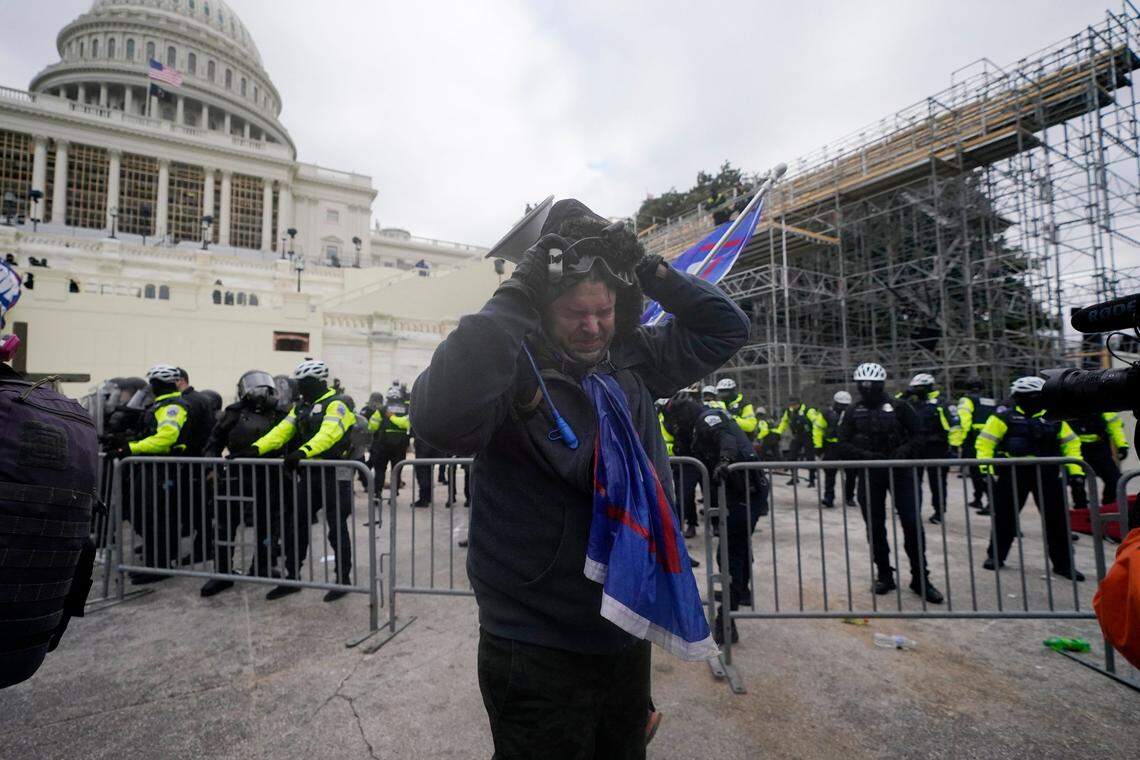 Police hold off Trump supporters who tried to break through a police barrier, Wednesday, Jan. 6, 2021, at the Capitol in Washington. As Congress prepares to affirm President-elect Joe Biden’s victory, thousands of people have gathered to show their support for President Donald Trump and his claims of election fraud.