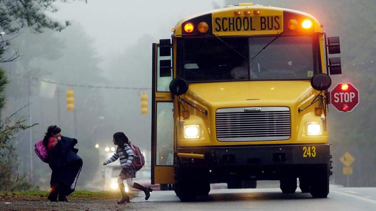 A school bus in North Carolina drops off students. Until 1988, school districts across the state used high school students as bus drivers.