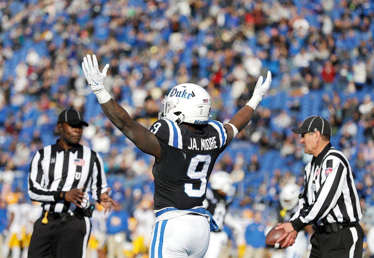 Duke’s Jaquez Moore celebrates after scoring a touchdown during the second half of the Blue Devils’ 30-19 win over Pittsburgh on Saturday, Nov. 25, 2023, at Wallace Wade Stadium in Durham, N.C.