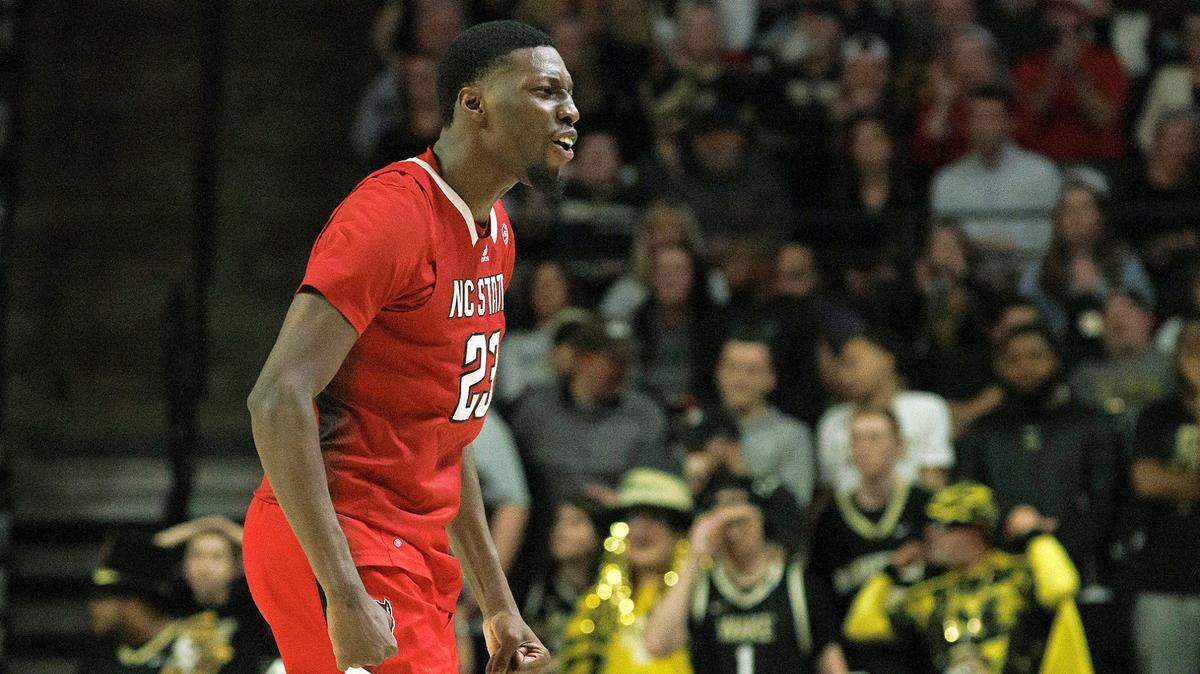 N.C. State’s Mohamed Diarra reacts after dunking the ball during the first half of the Wolfpack’s 83-79 loss to Wake Forest on Saturday, Feb. 10, 2024, at Lawrence Joel Veterans Memorial Coliseum in Winston-Salem, N.C.