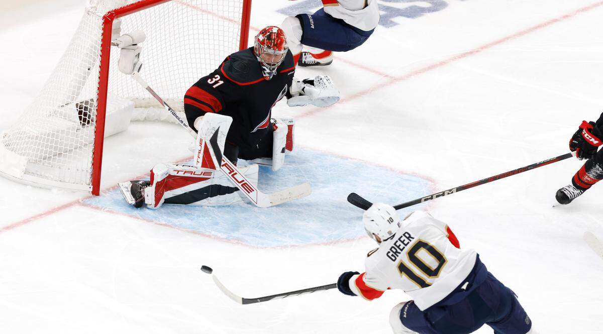 Panthers’ A.J. Greer (10) scores on Carolina’s Frederik Andersen (31) during the second period of the Carolina Hurricanes’ game against the Florida Panthers in Game 1 of the Eastern Conference Finals at the Lenovo Center in Raleigh, N.C., Tuesday, May 20, 2025.
